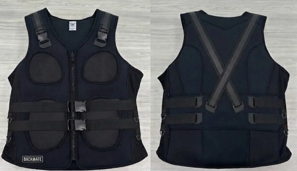 The Backmate prototype in all black, photographed front and back, with the reflective elements in a matching black