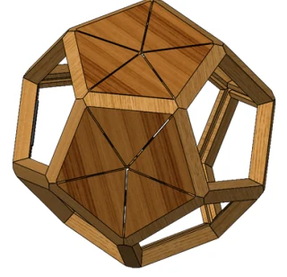 A wooden dodecahedron frame, the twelve faced structure the engraved tiles are built into